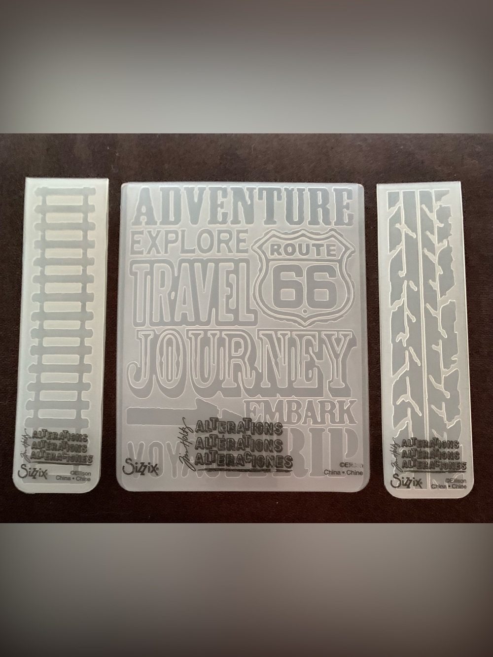 Tim Holtz Clear Embossing Folder Set - Travel Words & Borders. New without pkg